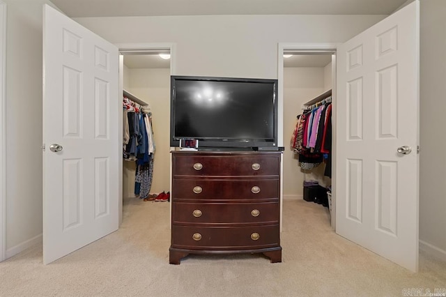 1100 Woodlawn Ave Unit K-61, Hot Springs, AR 71913 - bedroom featuring a closet, light colored carpet, baseboards, and a walk in closet