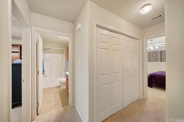 1100 Woodlawn Ave Unit K-61, Hot Springs, AR 71913 - corridor featuring light carpet, visible vents, and baseboards