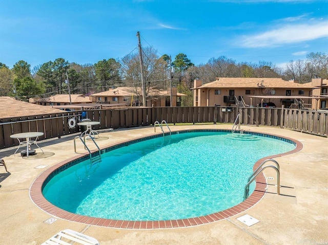 1100 Woodlawn Ave Unit K-61, Hot Springs, AR 71913 - community pool featuring a residential view, a patio area, and fence