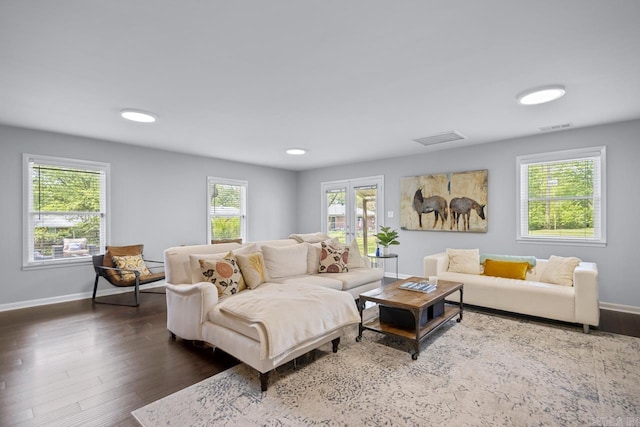 6808 Sandpiper Dr, Little Rock, AR 72205 - living area featuring a healthy amount of sunlight, baseboards, and dark wood finished floors