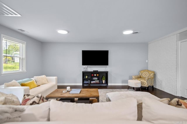 6808 Sandpiper Dr, Little Rock, AR 72205 - living room featuring visible vents, baseboards, and wood finished floors