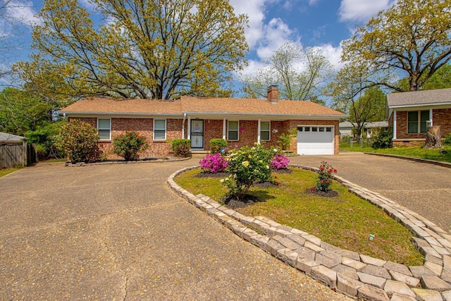 6808 Sandpiper Dr, Little Rock, AR 72205 - ranch-style home featuring a garage, aphalt driveway, brick siding, and a chimney