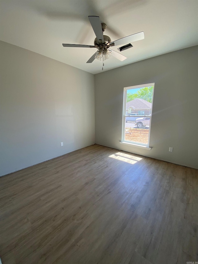 3512 Village Walk Dr, Bryant, AR 72022 - empty room featuring wood finished floors and ceiling fan