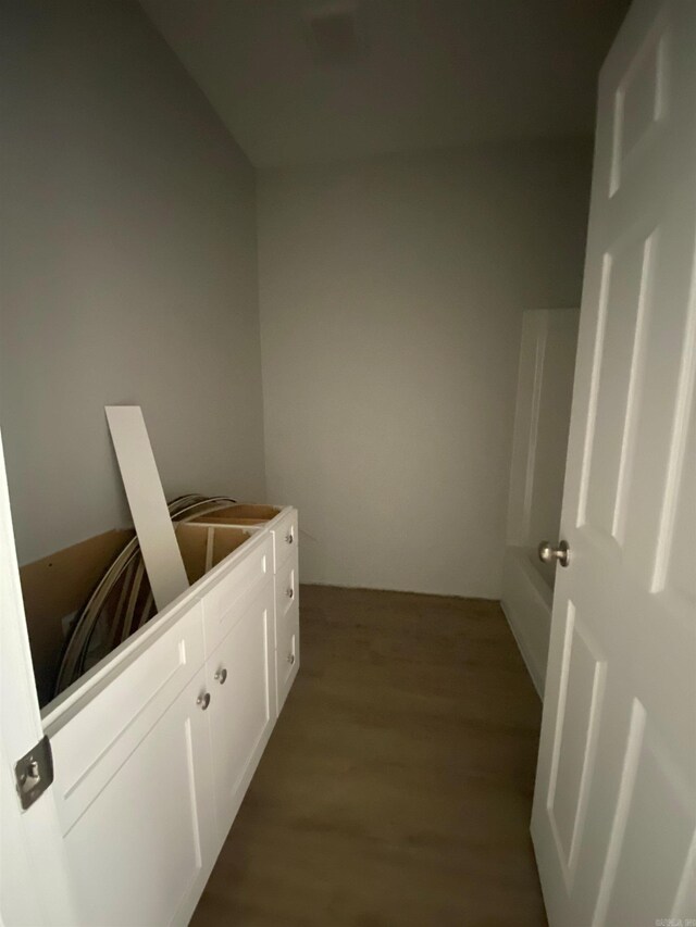 3512 Village Walk Dr, Bryant, AR 72022 - clothes washing area with wood finished floors