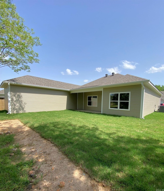 3512 Village Walk Dr, Bryant, AR 72022 - rear view of property with a yard and cooling unit