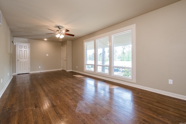 6 Broadmoor Dr, Little Rock, AR 72204 - empty room featuring dark wood-type flooring, baseboards, and a ceiling fan