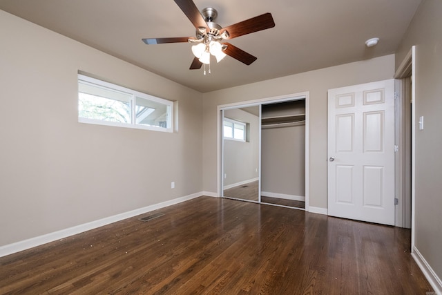 6 Broadmoor Dr, Little Rock, AR 72204 - unfurnished bedroom with visible vents, baseboards, a closet, ceiling fan, and dark wood finished floors