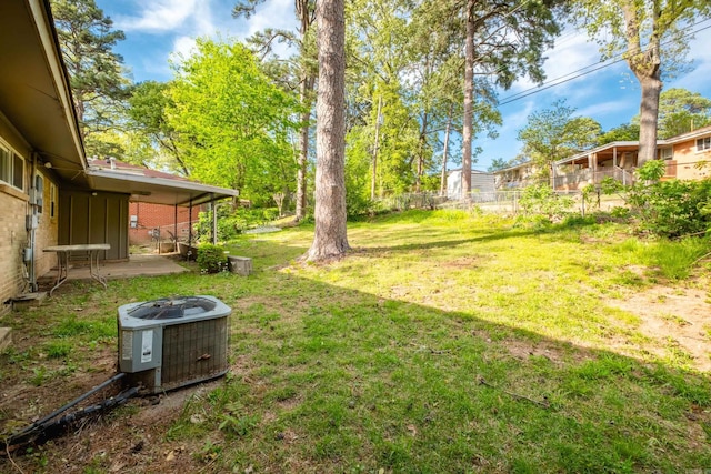 6 Broadmoor Dr, Little Rock, AR 72204 - view of yard featuring a patio, fence, and central AC unit