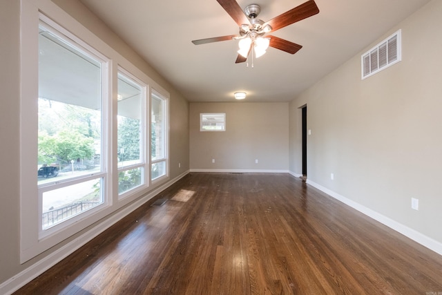 6 Broadmoor Dr, Little Rock, AR 72204 - empty room featuring baseboards, dark wood-style floors, and visible vents