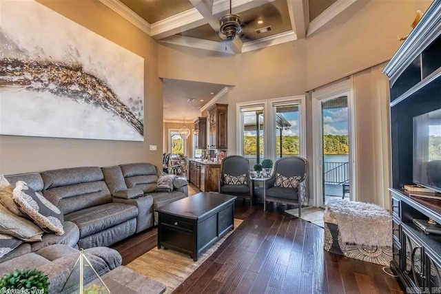 6550 Westminster, Benton, AR 72019 - living area with crown molding, ceiling fan, a towering ceiling, and dark wood-style floors