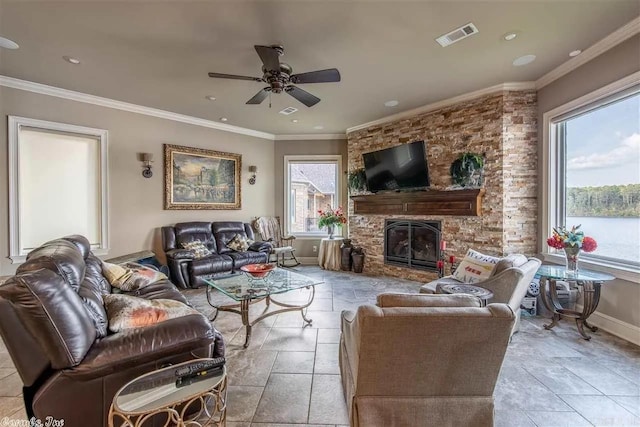 6550 Westminster, Benton, AR 72019 - living area with visible vents, baseboards, a ceiling fan, and a healthy amount of sunlight