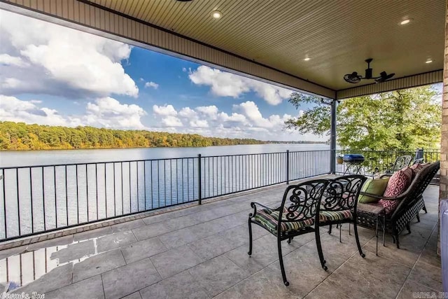 6550 Westminster, Benton, AR 72019 - view of patio featuring ceiling fan and a water view