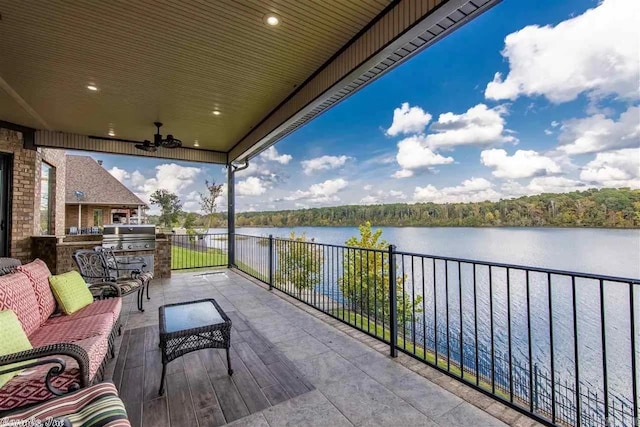 6550 Westminster, Benton, AR 72019 - view of patio with outdoor lounge area, grilling area, a ceiling fan, and a water view