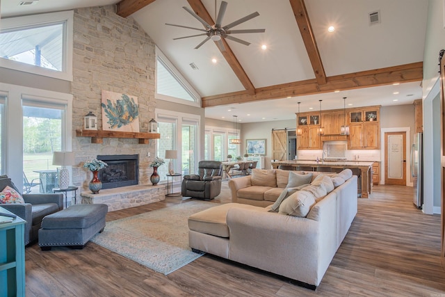234 Barrett Ln, Cabot, AR 72023 - living area featuring high vaulted ceiling, ceiling fan, visible vents, and a wealth of natural light