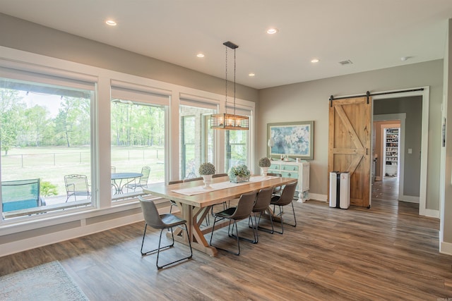 234 Barrett Ln, Cabot, AR 72023 - dining area with recessed lighting, a barn door, dark wood-style flooring, and baseboards