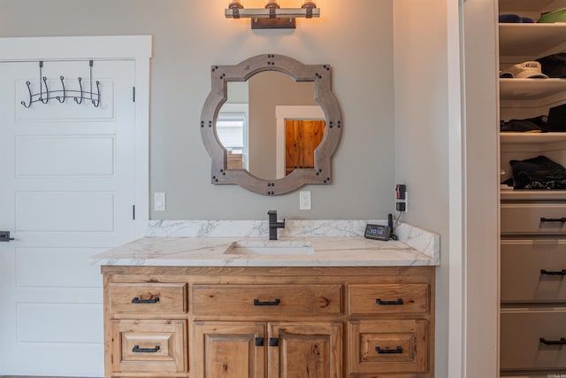 234 Barrett Ln, Cabot, AR 72023 - bathroom with a spacious closet and vanity