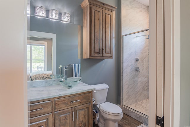 234 Barrett Ln, Cabot, AR 72023 - full bath with toilet, a shower stall, vanity, and wood finished floors