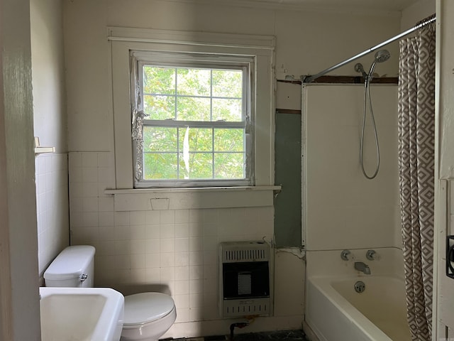 8209 Dollarway Rd, White Hall, AR 71602 - bathroom featuring shower / bath combo, toilet, heating unit, tile walls, and a sink