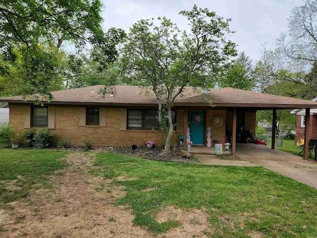 801 Randall Dr, Searcy, AR 72143 - single story home with brick siding, a front lawn, an attached carport, and driveway