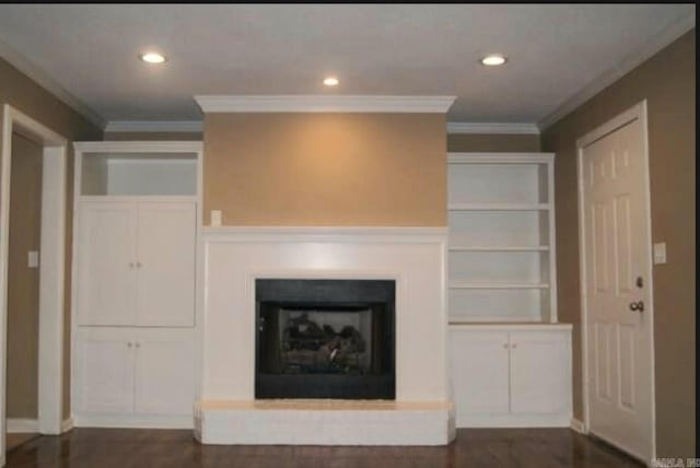 801 Randall Dr, Searcy, AR 72143 - unfurnished living room with ornamental molding, baseboards, recessed lighting, and dark wood-style floors