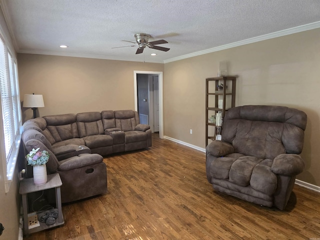 801 Randall Dr, Searcy, AR 72143 - living room with baseboards, a textured ceiling, crown molding, ceiling fan, and wood finished floors