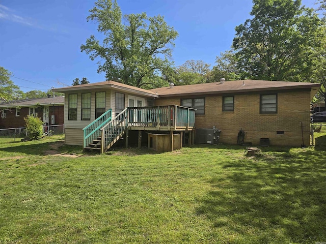 801 Randall Dr, Searcy, AR 72143 - back of house featuring a yard, crawl space, fence, brick siding, and a wooden deck