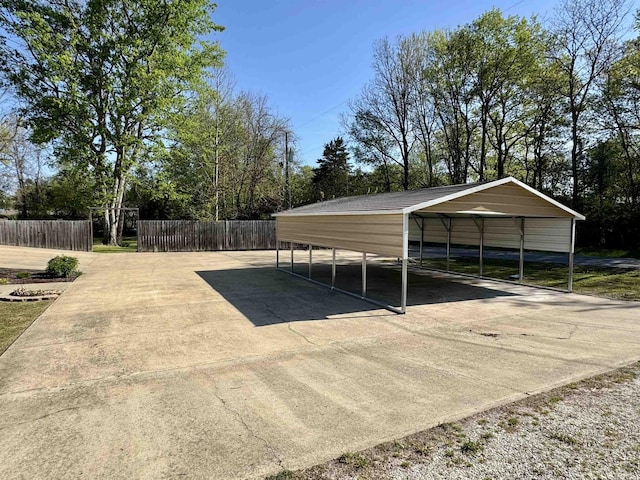 25 Heritage Ln, Melbourne, AR 72556 - view of parking / parking lot with a carport, driveway, and fence