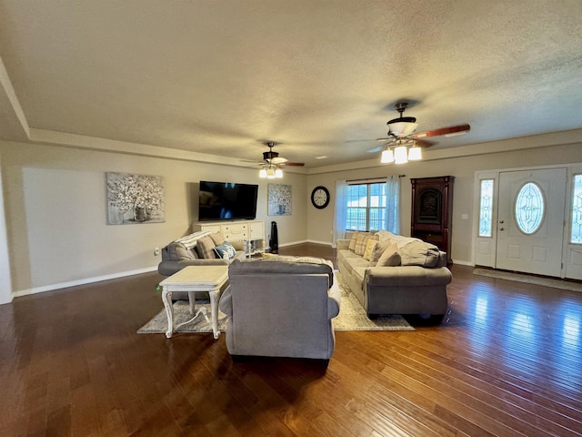 25 Heritage Ln, Melbourne, AR 72556 - living area featuring hardwood / wood-style flooring, baseboards, a textured ceiling, and ceiling fan