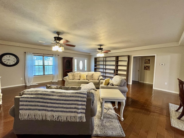 25 Heritage Ln, Melbourne, AR 72556 - living room with a textured ceiling, a ceiling fan, baseboards, and dark wood-style flooring