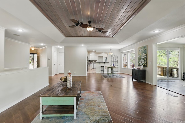 6 Narvaez Way, Hot Springs Village, AR 71909 - living area with a tray ceiling, wood finished floors, a ceiling fan, ornamental molding, and baseboards