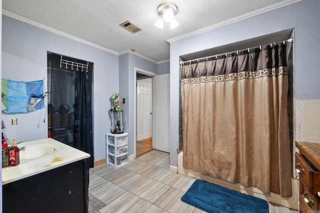bathroom with tile patterned floors, vanity, curtained shower, ornamental molding, and visible vents