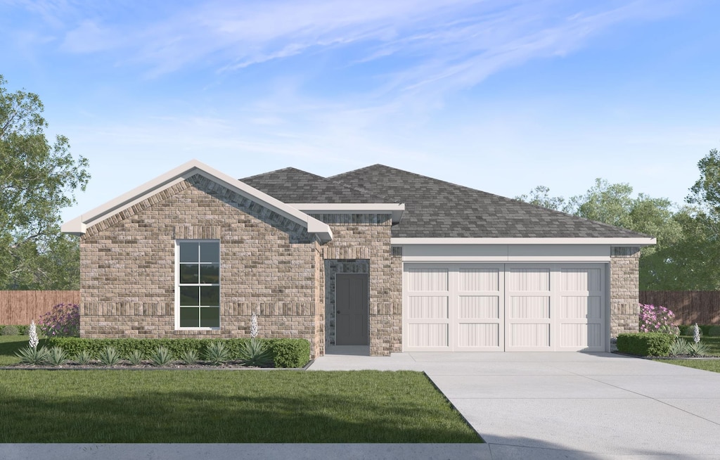 view of front of property featuring a garage, fence, a front yard, and concrete driveway