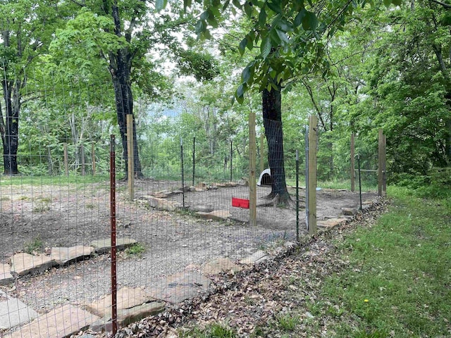 view of yard with a forest view