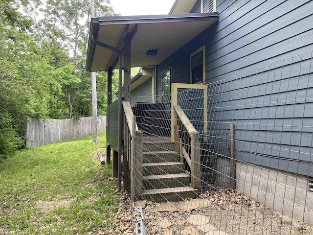 property entrance featuring fence