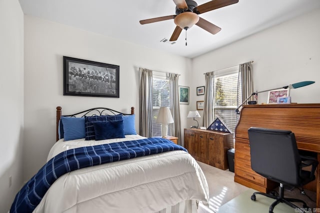 bedroom with visible vents and ceiling fan