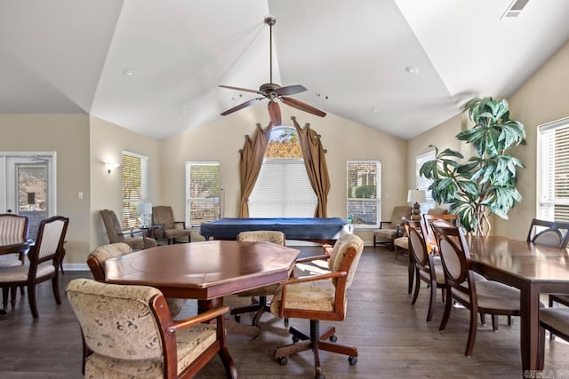 dining space with dark wood-style floors, vaulted ceiling, and visible vents