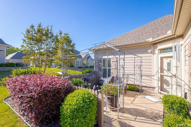 view of patio with a residential view