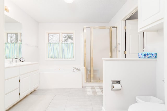 18 Fastota Ln, Hot Springs Village, AR 71909 - bathroom with a stall shower, toilet, tile patterned flooring, a garden tub, and vanity