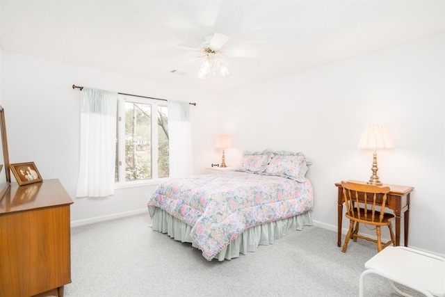 18 Fastota Ln, Hot Springs Village, AR 71909 - bedroom featuring ceiling fan, baseboards, and carpet flooring