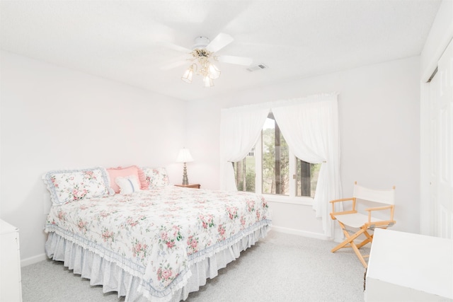 18 Fastota Ln, Hot Springs Village, AR 71909 - carpeted bedroom featuring baseboards, a ceiling fan, visible vents, and a closet