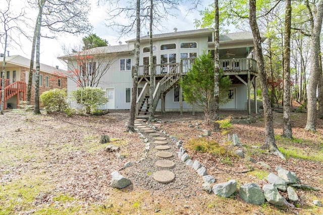 18 Fastota Ln, Hot Springs Village, AR 71909 - back of house featuring a wooden deck, a ceiling fan, and stairs