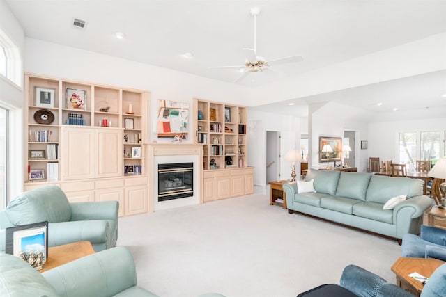 18 Fastota Ln, Hot Springs Village, AR 71909 - carpeted living room with recessed lighting, a glass covered fireplace, visible vents, and ceiling fan