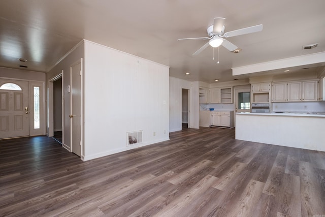 309 Del Rio Dr, Little Rock, AR 72205 - unfurnished living room with dark wood finished floors, visible vents, and ceiling fan