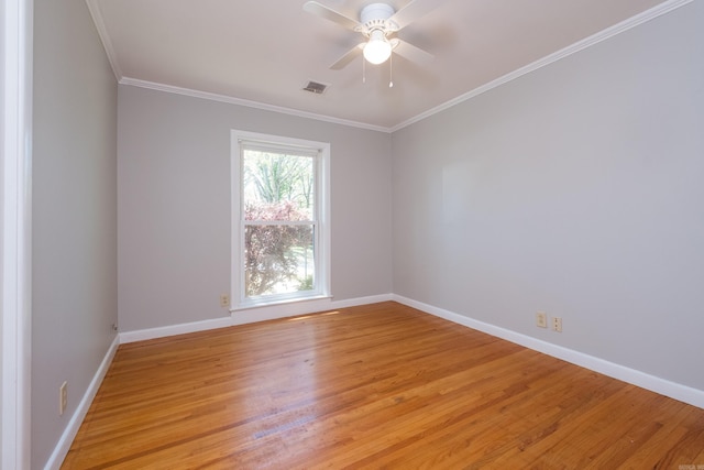 309 Del Rio Dr, Little Rock, AR 72205 - unfurnished room featuring baseboards, crown molding, and light wood-style floors