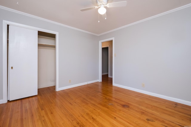 309 Del Rio Dr, Little Rock, AR 72205 - unfurnished bedroom featuring light wood-style flooring, baseboards, a closet, and crown molding