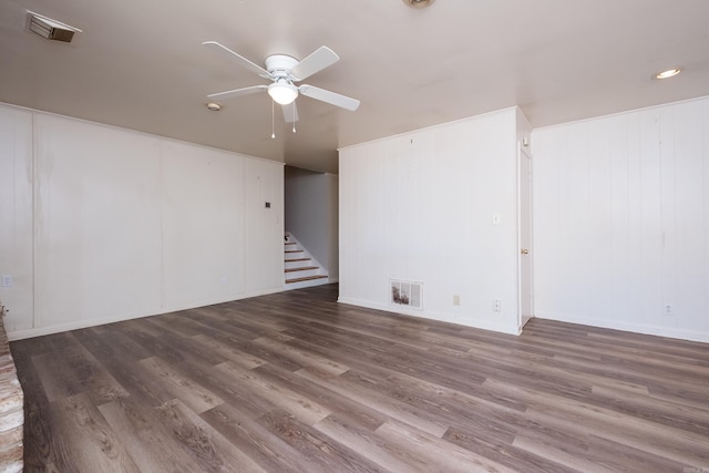 309 Del Rio Dr, Little Rock, AR 72205 - spare room with stairway, wood finished floors, visible vents, and ceiling fan