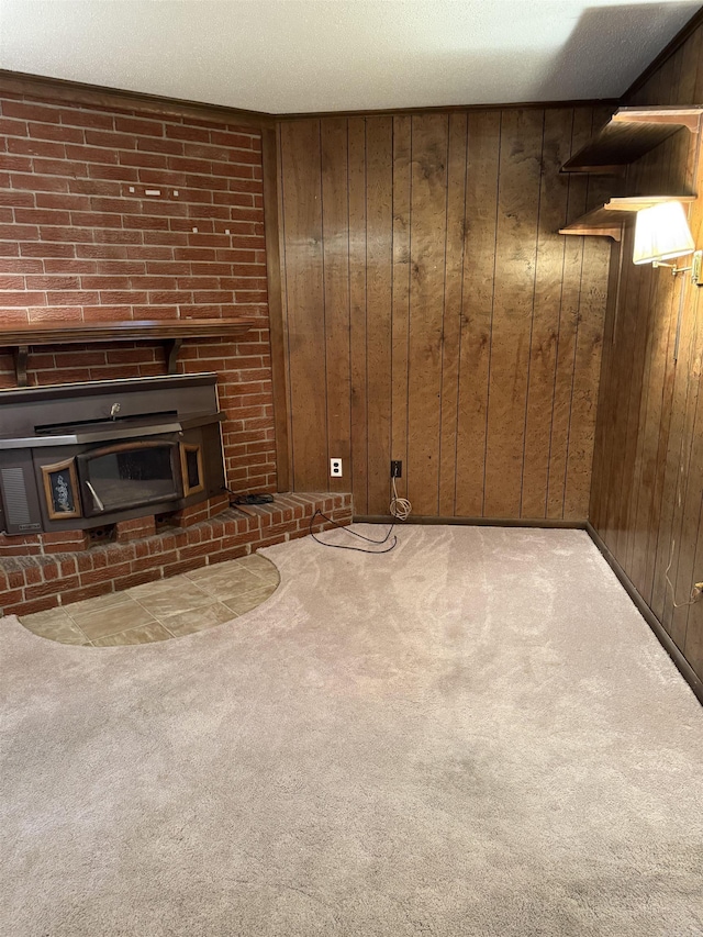 23 Dalewood, Searcy, AR 72143 - unfurnished living room with a fireplace, wooden walls, and carpet