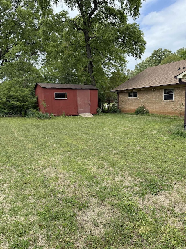 23 Dalewood, Searcy, AR 72143 - view of yard featuring an outbuilding and a storage shed