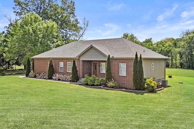 single story home with central AC, a front lawn, brick siding, and a shingled roof