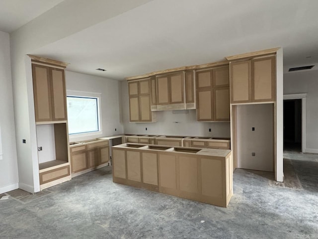 121 Panorama Dr, Hot Springs Village, AR 71909 - kitchen featuring a center island and light brown cabinets